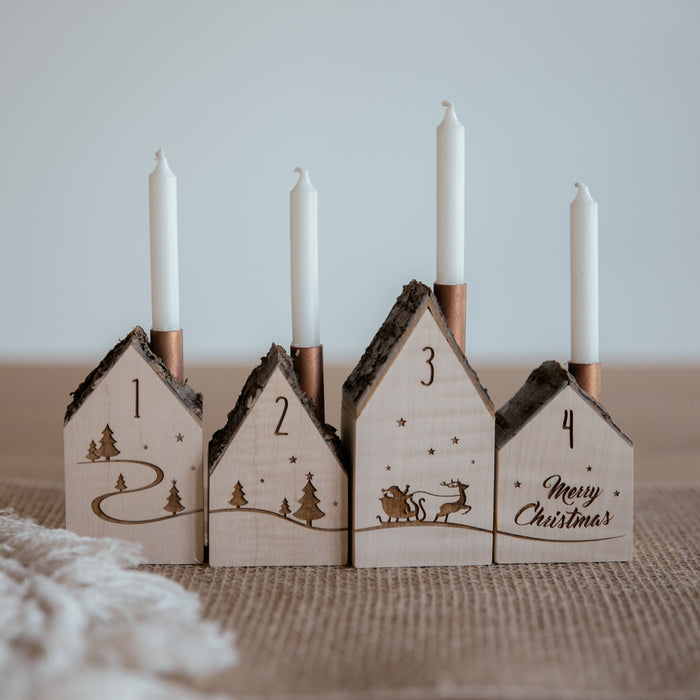 Kerzenhäuser aus Holz als Adventskranz